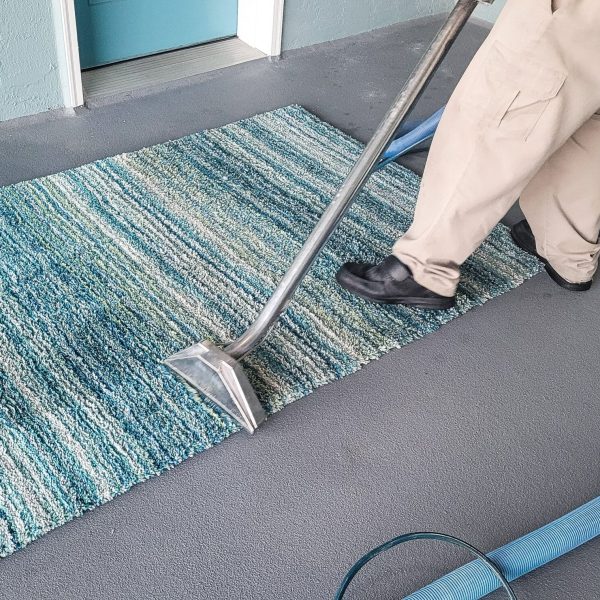 man-has-small-business-cleaning-carpets-by-shampoo-2023-11-27-05-13-09-utc-min